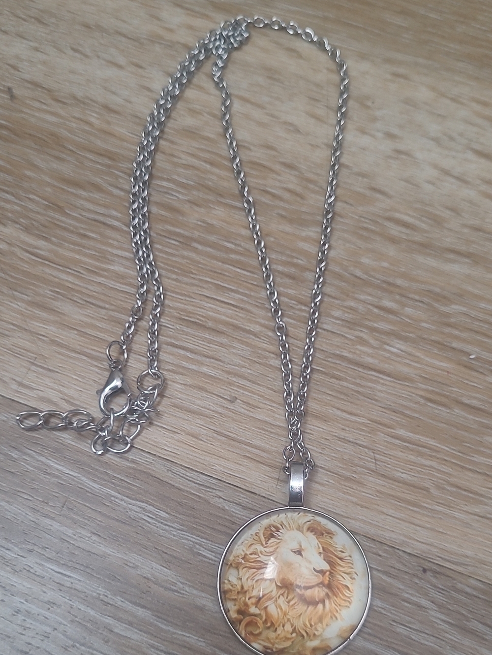 Silver-Tone Lion Pendant Necklace in Gold and Cream